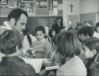 School pupils hold mass for 'Martyred' Laporte, Father Drake Will of St