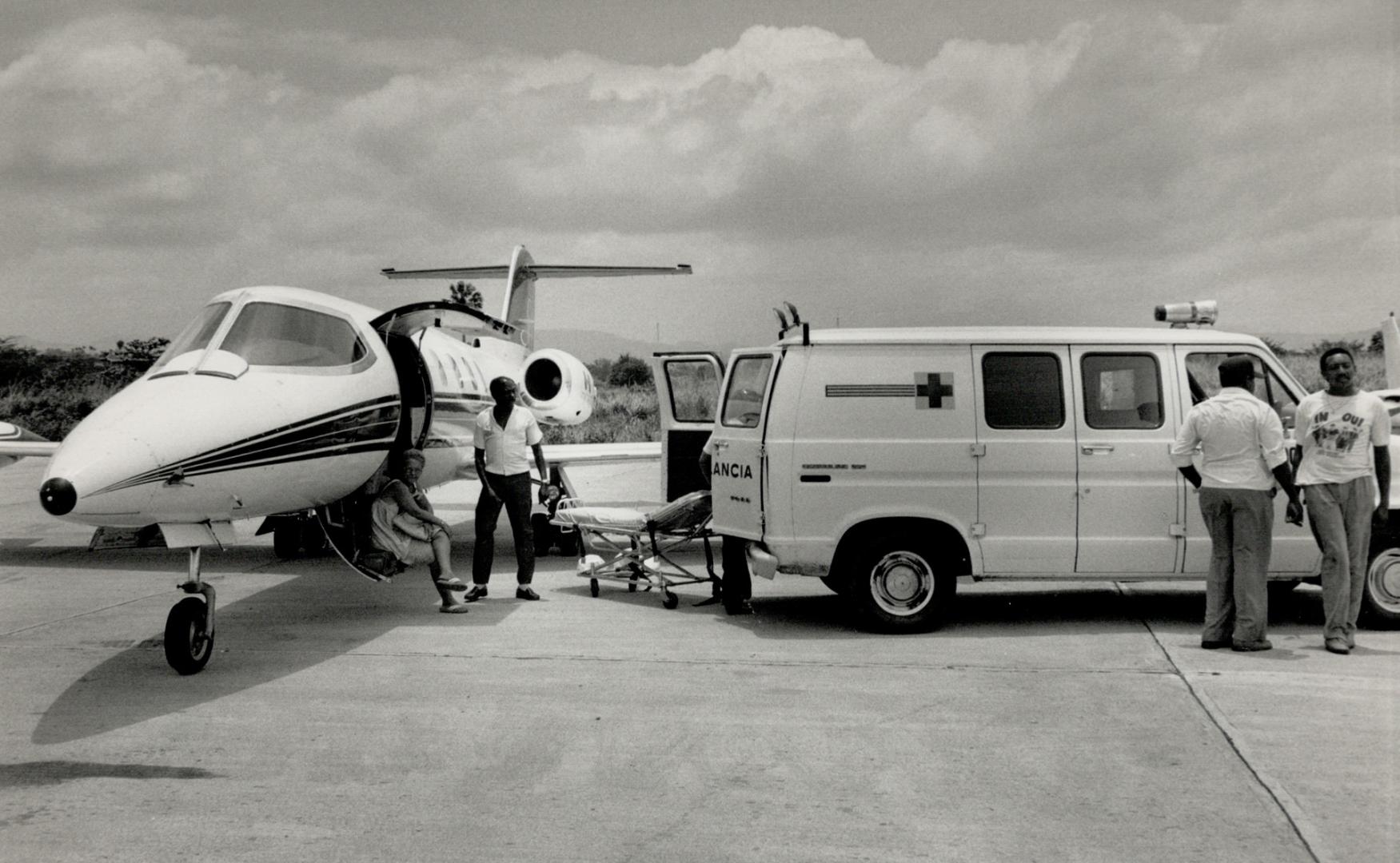 Victim transferred: A Canadian Learjet waits on the tarmac of an airport in the Dominican Republic after shooting victim Kevin Campbell was brought on board