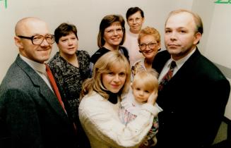 Shelby Walsh with parents Dianna and Glen with people who helped find her