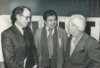 er being made an Honorary member of Canadian uncil for Racial Harmony, James Carson (right), is congratulated by uce McLeod, former moderator of Unite(...)