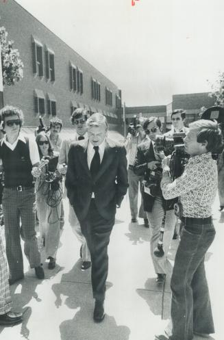 An hour after the shootings, Premier William Davis arrived at Centennial Secondary School, where his daughter Cathy, 15, is a student. She was not hur(...)