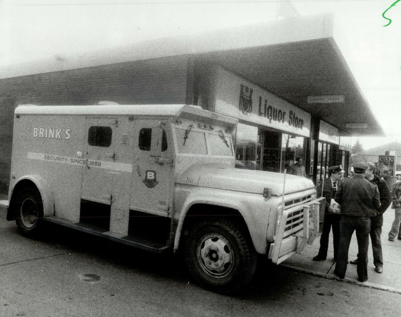 Daylight robbery: A youth escaped with $32,000 in a daring holdup at a Scarborough liquor store yesterday after slugging a Brink's armored car guard and making-off with his satchel