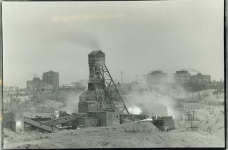 Disaster site: Giant mine, set against Yellowknife's skyline, is still operating