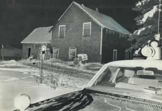 Scene of shooting at Minden was this snow covered summer cottage where two OPP officers died in the snow after blasted from a distance of eight feet b(...)