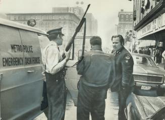 Murder in a hotel: Armed police stand by after a killing in the Royal York