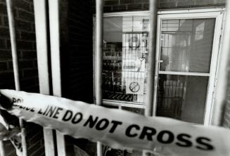 Killers Hunted, Metro police tape blocks off the Downsview variety store of SuckJu Ryu, 56, today after the shopkeeper was shot to death by two men ab(...)