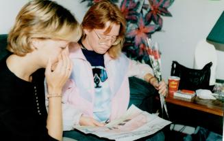 Mother's Grief: Doreen Dobson, right, with friend Dee Bakalar, looks at children's handmade cards