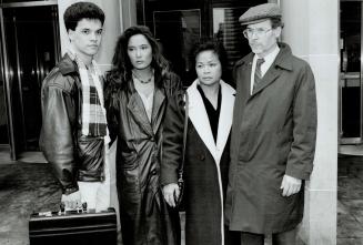 Family ordeal: Elizabeth Bain's brother Paul, sister Cathy and parents Julita and Ricardo gather outside court yesterday after jury rendered its verdict