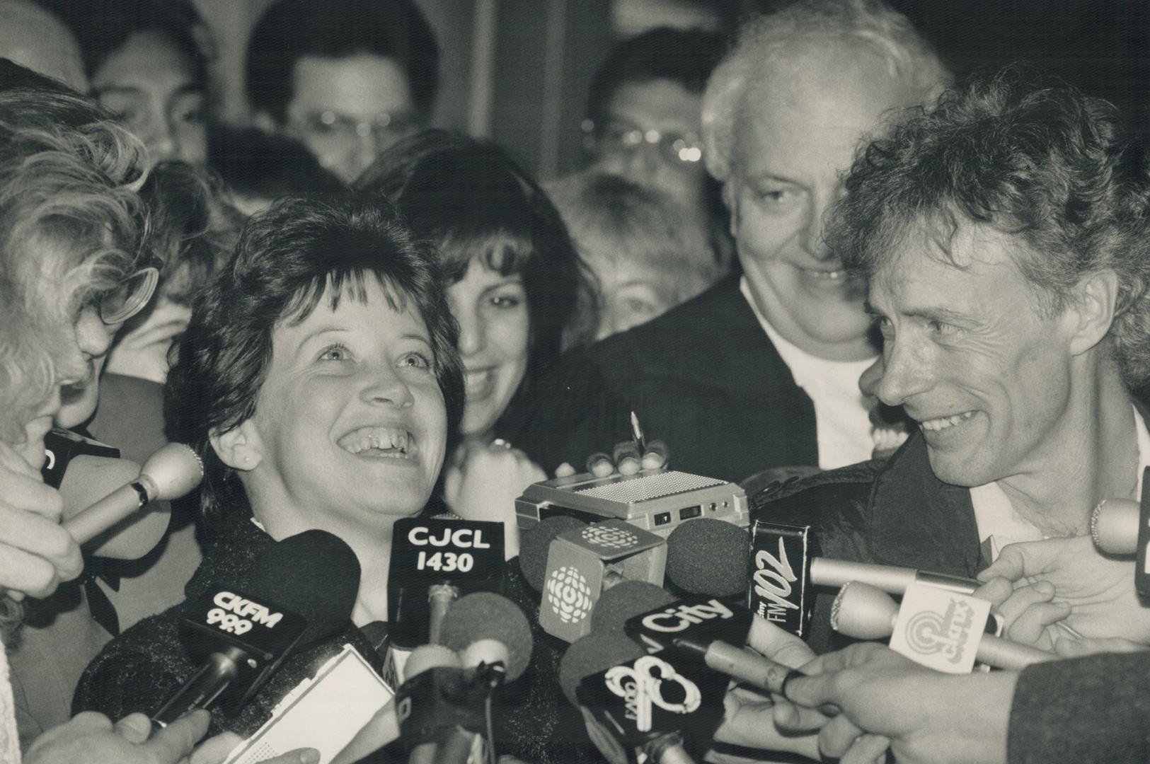 Not guilty: Julie Bowers, husband John (foreground) and lawyers Cindy Wasser and Jack Pinkofsky beam after Julie's acquittal last night