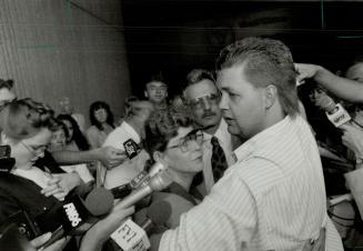 Over at last: Kenneth Jessop, Christine's 22-year-old brother, hugs his parents Janet and Robert outside the London courthouse