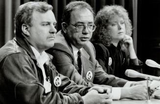 Strong views: Inquest jury foreman Daniel Nixon, centre, with Robert Burnham and Sandra Pierce, say Ottawa should pay legal fees of Stephenson family