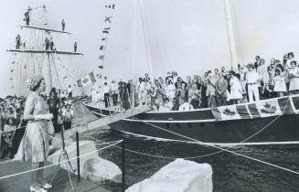 The Queen names a new brigantine Playfair while young sailors watch from a sister ship, the Pathfinder, which is used to train Sea Cadels, off Confede(...)