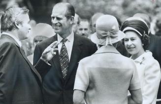 Ontario Premier William Davis and his wife spoke with the Queen and Prince Philip this afternoon when the royal couple visited Gage Park in Brampton t(...)