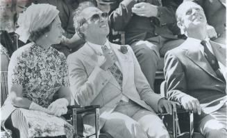 His eyes are on the snowbirds, the Canadian Forces aerobatic team, as Prime Minister Pierre Trudeau attends opening of Commonwealth Games with the Que(...)