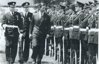 In Halifax, the first stop, the Prince inspected an honor guard, the first of many such ceremonies