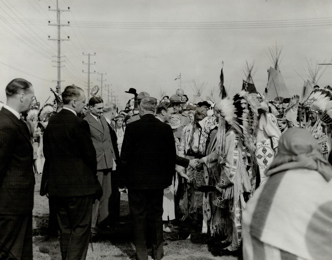 Cowboys yipped, Indians beat tom-toms and medicine men yelled chants in the ears of the King and Queen when all Calgary turned out en masse to give the beloved sovereigns a rousing western welcome