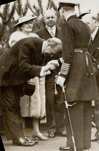 Hon. Albert Matthews, lieutenant-governor of Ontario, bows low as he welcomes the King to Toronto