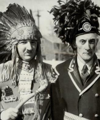 First citizens whoop their welcome, Out of a secret cache in many a tepee have been brought treasured feather head-dresses by Quebec's Huron Indians, said to be the oldest tribe in North America