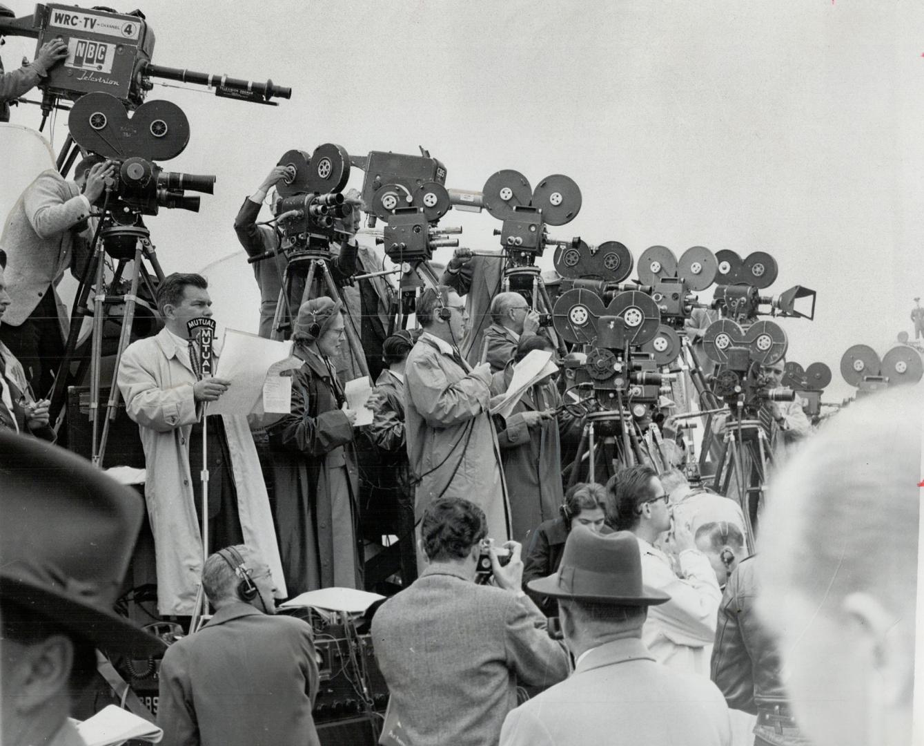 Battery of TV and Newsreel cameras covering the Queen's visit to Washington shows the intensity of U