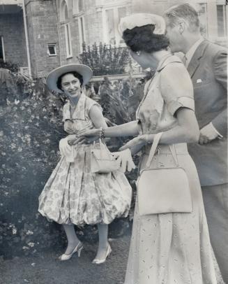 Newest style harem skirt is worn by the Princess for the garden party and contrasts with the simplicity of her hat