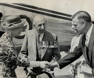 Her salute was muted, Lt.-Gov. Keiller Mackay looks on as Premier Robarts, right, greets Princess Royal at Malton today