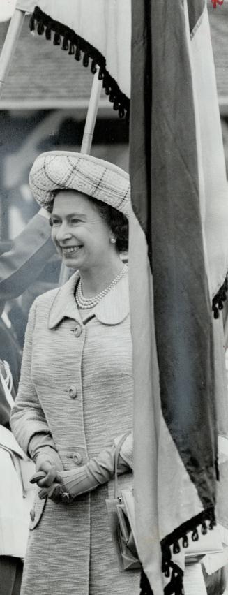 Lacy Straw Breton hat was becoming, Queen chooses hats that won't hide her face