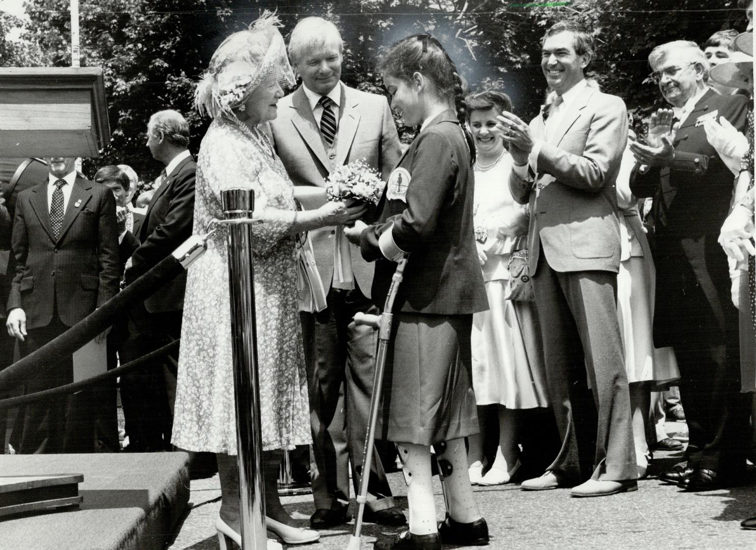 Royal meeting: Nancy Kralovic, the 12-year-old Easter Seals Society Tammy, met the Queen Mother and Premier William Davis at Queen's Park during the recent royal visit