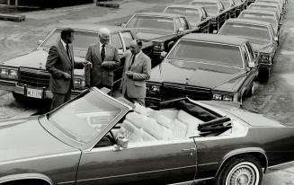 The call of a familiar duty brought Lewis Overton (right) out of retirement to prepare cars fit for The Queen to ride in later this month ? if a feder(...)