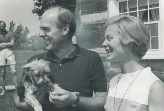 The Duchess, pretty, blonde, and cool in a green and white summer linen, is shown with her brother, John Worsley