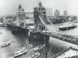 Queen Elizabeth's barge (Foreground right) about to pass