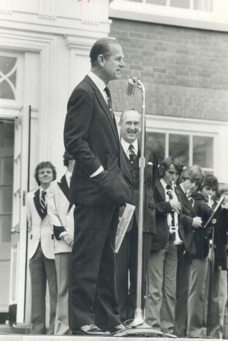 Prince Power, Upper Canada College students turned out in force yesterday to cheer Prince Philip (inset) when he toured the school to mark its 150th anniversary weekend celebrations