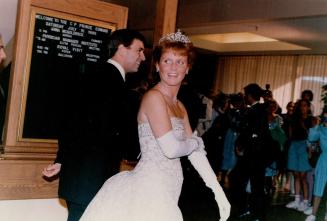 Fergie sparkles: In her only appearance in full evening dress on Prince Edward Island, Sarah, Duchess of York, wears a cream-colored lace dress to a dinner last night