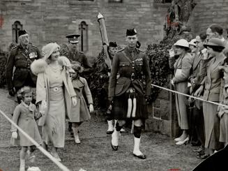 The Duke and Duchess of York, with their children, attending the ceremony at Glamis Castle when the 45th Black Watch received new colors replacing those lost in a fire at Dundee last year