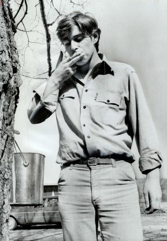 Prince with a sweet tooth, Prince Andrew, 17, who is spending the March break from Lakefield College School at farm of his roommate, Peter Lorriman, a(...)