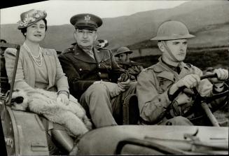 Britain's Queen went for a ride in a jeep during an inspection tour of an encampment of U