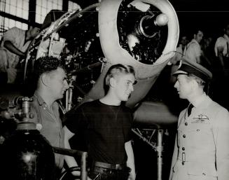 The Duke of Kent stops to talk to two employees of the Canadian Car and Foundry Co