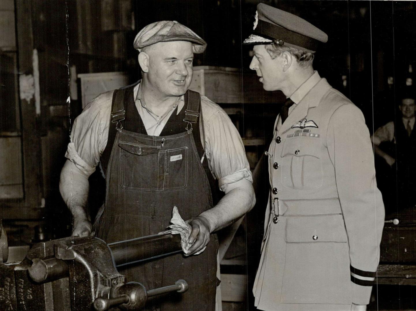 A worker at the John Inglis plant, which the Duke of Kent visited Thursday, finds himself quite at ease as he chats with the royal visitor