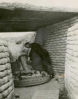 Trench-wrecker--Squatting toad-like in its casemate at Vimy, this grim dispatcher of death lobbed its projectiles across no-man's-land to blow trenches flat