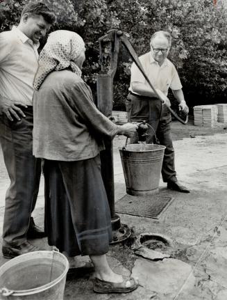 In grim hamlet of Chodel, his paternal grandparents' birthplace, Givens tries out pump