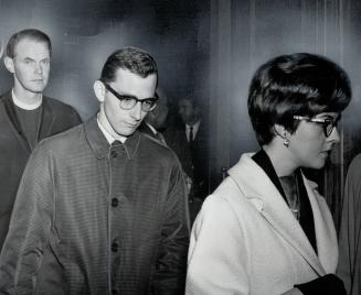 At Inquest into death of Katherine Globe, assistant priest Douglas Tisdall (left) and girl's brother, Alex Globe, 24, stand outside courtroom in old c(...)