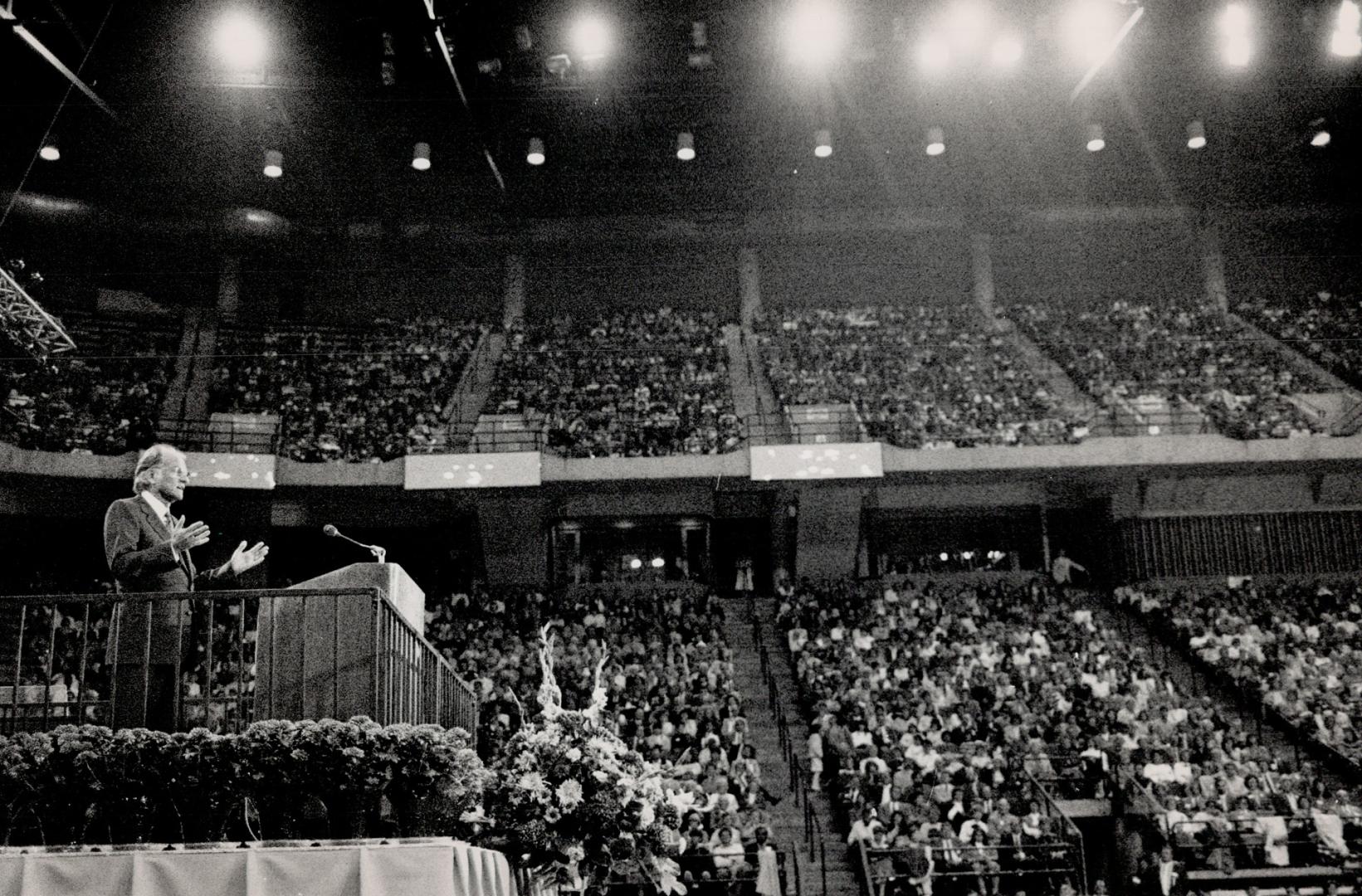 Full House: Evangelist Billy graham tells close to 15,000 people in Hamilton's Copps Coliseum last night that you cannot buy your way into heaven