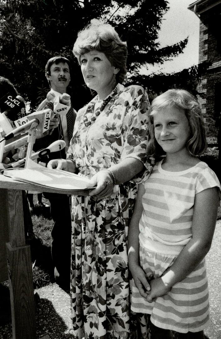 Running hard: Controller Barbara Greene, accompanied by daughter Carly, 7, begins her drive to oust Mel Lastman as North York's mayor at a press conference yesterday