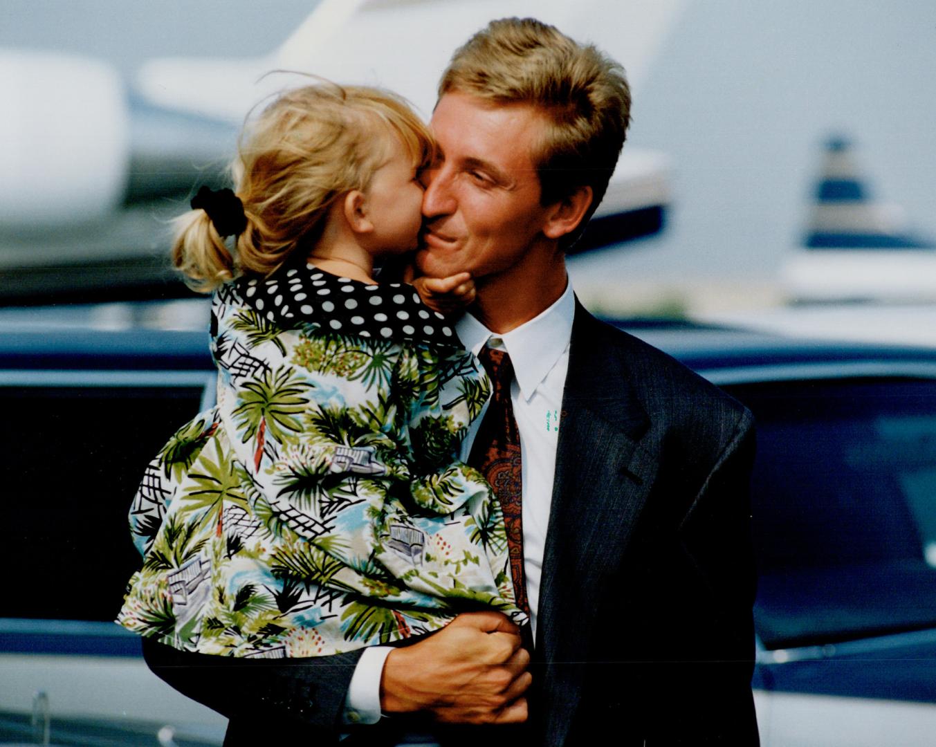 Argos coming home. Argo co-owner Wayne Gretzky arrives in Toronto with daughter Paulina yesterday for the Argos' home opener tonight. Meanwhile, over (...)