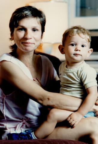 Family ties: Nicky Guadagni, who plays Juliet in Toronto Free Theatre's open air production of Romeo And Juliet, shares a moment with son Griffin, 15 months old