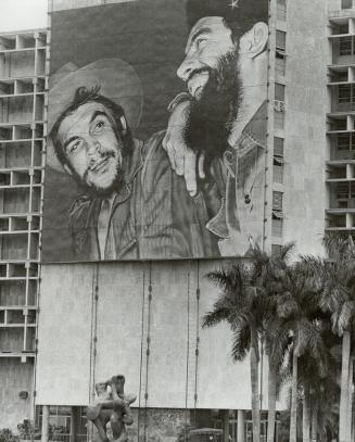 Posters of slain revolutionary hero Ernesto (Che) Guevara, left, are everywhere in Cuba