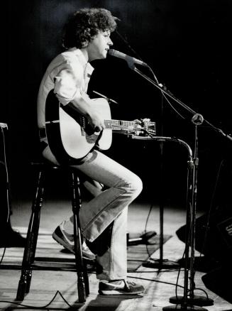 Arlo Guthrie: He cut loose with some biting satire in concert with Pete Seeger at O'Keefe Centre