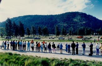 Left: He's on the home stretch and, as always in Canada, the crowds turn out to cheer him along