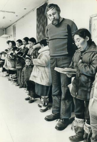 Joining Inuit singers, Star Religion Editor Tom Harpur is warmly attired for Arctic weather