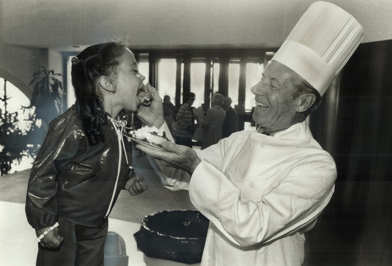 Berry good. Michelle Ringshausen, 3, gets a spoonful of strawberry shortcake from Scarborough Mayor Gus Harris at the borough's annual seniors strawbe(...)