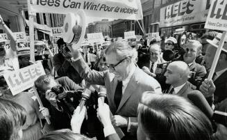 Tory leadership candidate George Hees gets exuberant welcome from supporters as he arrives in one of his London double-decker buses at Royal York, whe(...)